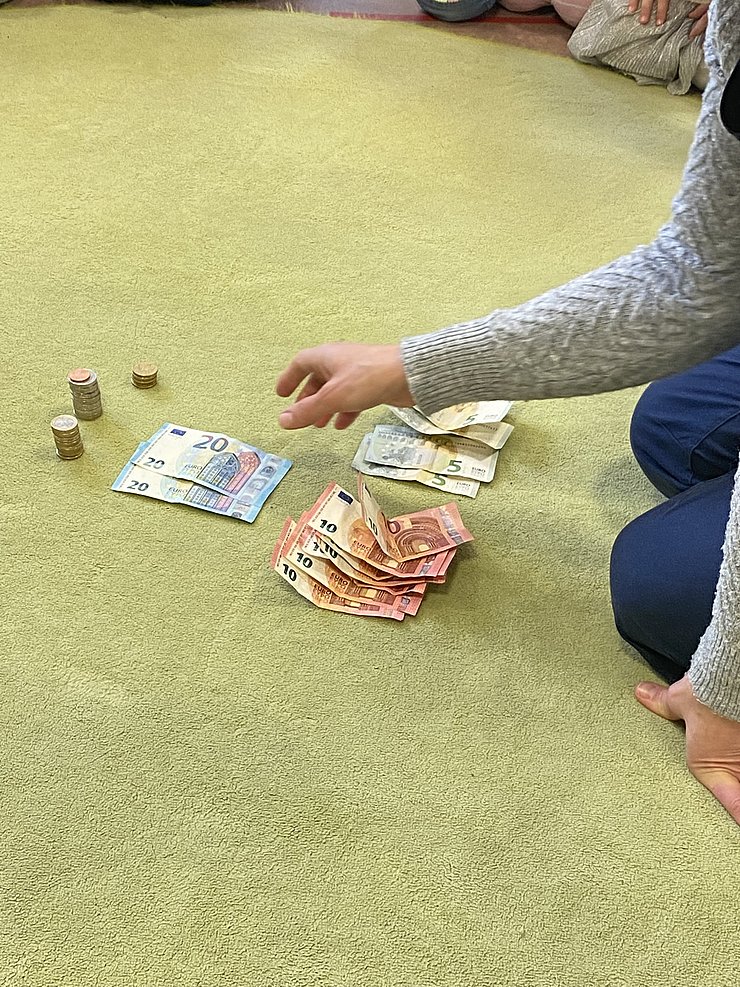 Geld (Münzen und Schein)