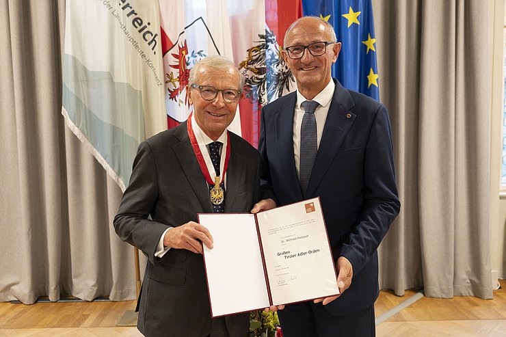 © Land Tirol/Sedlak Zwei Männer blicken in die Kamera.