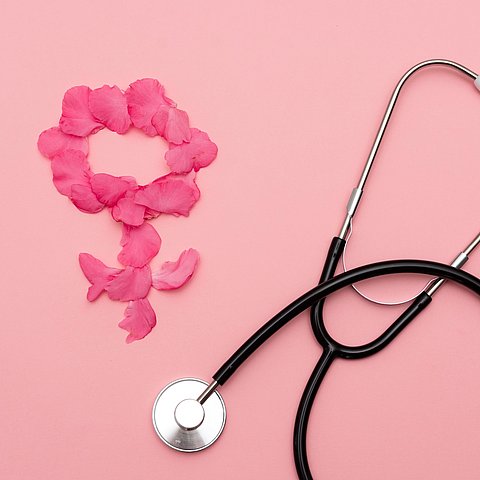 Stethoscope,With,Female,Symbol,Made,Of,Pink,Petals,On,Pink
