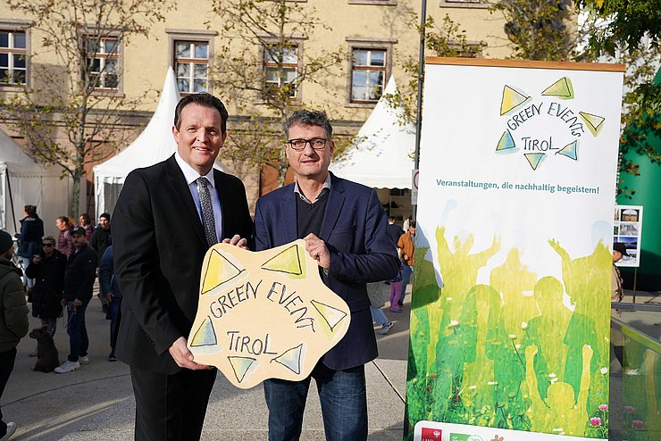 © Land Tirol/Reiter Zumtobel und Stigger mit Green Events Schild