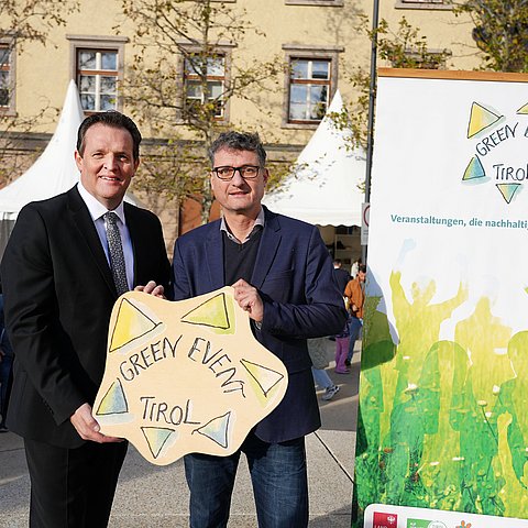Zumtobel und Stigger mit Green Events Schild