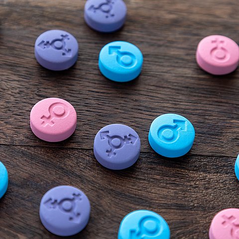 Hormonal,Pills.,Gender,Symbols,Of,Man,,Woman,And,Transgender.,Colored